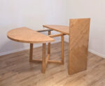 Round extendable dining table