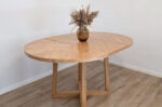 Round extendable dining table