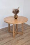 Round extendable dining table