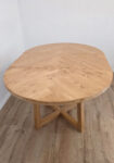 Round extendable dining table